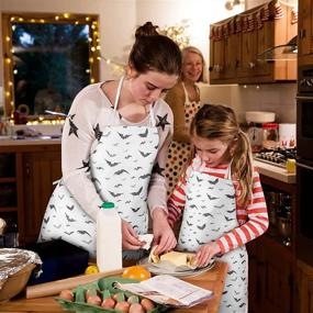 img 2 attached to 🦇 Halloween Bat Kitchen Aprons for Women - Set of 2 - Perfect for Outdoor BBQ Activities, Parties, and Cooking