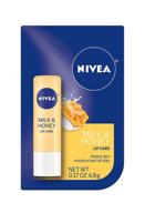 💋 nivea soothing lip care: kiss of milk and honey (pack of 6) - 0.17 ounce logo