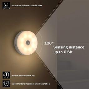 img 1 attached to SIBI Motion Sensor LED Light: USB Rechargeable Stick-On Puck Light for Closet, Wardrobe, Kitchen Cabinet - Warm White 3000K (1 Pack)