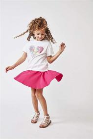 img 1 attached to 🎀 Pink Peacock Girls' Simple Skater Skort: Comfortable and Versatile Clothing Option