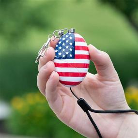 img 1 attached to SABRE PA-USA-02 Personal Alarm with Snap Clip - Ear-piercing 130dB Siren Reaches Up To 1,000 Feet (300M) in All Directions (Approx. 4 City Blocks!) – Enhance Safety with a Patriotic Twist