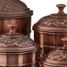 img 1 attached to Classic Copper Old Dutch Antique Heritage 🏺 Canister 4 Piece Set: Timeless Elegance for Your Kitchen