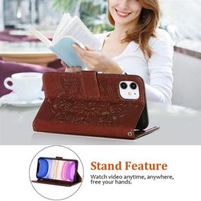 img 2 attached to 📱 JanCalm iPhone 11 Wallet Case: Classic Pattern, PU Leather, Wrist Strap, Card Holder, Stand Feature, Brown