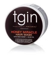 маска для волос и глубокого ухода за волосами с маслом оливы и сырым медом от tgin - 12 унций - для натуральных, сухих и кудрявых волос. логотип