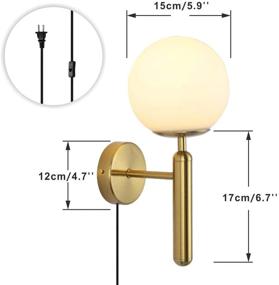 img 3 attached to 🌟 Golden Mid Century Modern Wall Sconce with On/Off Switch – KCO Lighting Industrial Matte Globe Glass Wall Mounted Light for Bedroom and Vanity (Gold Plug-in)