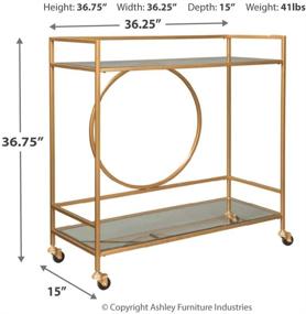 img 1 attached to 🍾 Glam Metal Bar Cart with Caster Wheels, Gold by Signature Design - Ashley Jackford