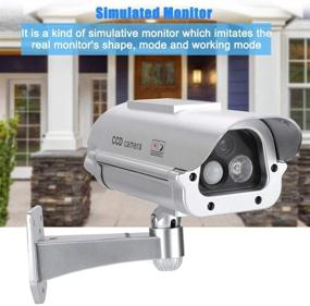 img 2 attached to 📷 Sliver Solar Powered Dummy Camera - Outdoor/Indoor Imitation IR CCTV Human Sensor Flash Lights. Enhance Surveillance and Security.