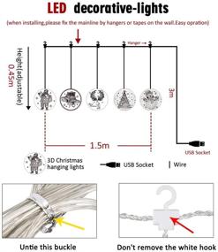 img 2 attached to 🌟BLOOMWIN 9.8 футов USB-питания Оконные праздничные огни Декоративные 3D Висячие светодиодные шторные огни с теплым белым сиянием для внутренних окон, стен, каминов, дверей, спален, открытых путей, патио-декораций
