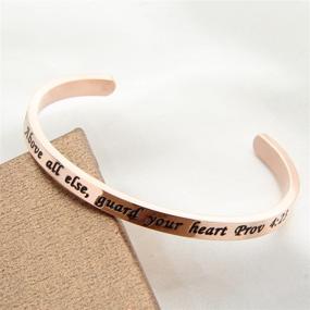 img 1 attached to 📿 FEELMEM Above All Else Guard Your Heart Prov 4:23 Bible Verse Bracelet: A Christian Cuff Bangle Emphasizing Proverbs 4:23