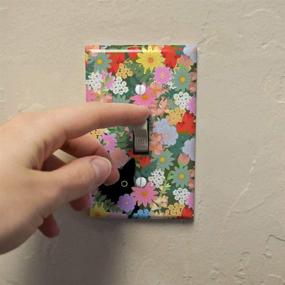 img 1 attached to 🐱 Discover the Whimsical Beauty: GRAPHICS & MORE Black Cat Hiding in Spring Flowers Plastic Wall Decor Toggle Light Switch Plate Cover