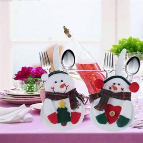 img 1 attached to 🎄 Deggod 8Pcs White Snowman Tableware Holders Set for Christmas Party Decorations and Xmas Dinner - Festive Knife and Fork Bags Covers for Thanksgiving, New Year - Elegant Table Decor Ornaments