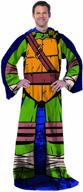 🐢 nickelodeon's teenage mutant ninja turtles being leo comfy throw blanket with sleeves - adult, 48" x 71", multi-color logo