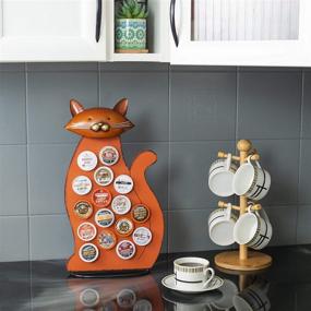 img 1 attached to 🐱 Organize and Display Your K-Cups with the Made Easy Kit Front Facing Countertop Coffee Pods Holder - Perfect Coffee Bar Decor for Home Cafe featuring an Adorable Orange Cat