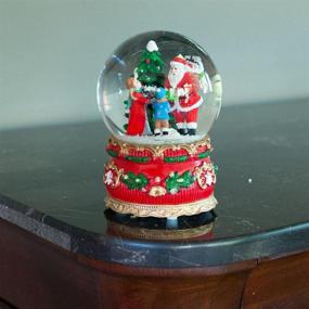 img 1 attached to Зачаровывающий музыкальный снежный шар "Санта": сияющая фигурка новогоднего подарка.