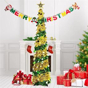img 4 attached to Ceephouge 5FT Pop Up Christmas Tinsel Tree, Golden Green Collapsible Artificial Pencil Xmas Thin Tree with Shiny Tree Top Stars and Banners - Perfect for Holiday Christmas Thanksgiving Party Decorations