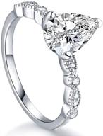 1.0 ct pear-cut milgrain engagement ring with sterling silver, pear solitaire, dot & marquise accents and half eternity band logo