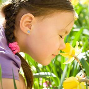 img 2 attached to 🌸 Delicate Rhodium Plated Flower Stud Earrings with Crystal Cubic Zirconia for Toddlers and Young Girls - Secure Screw Back, 5mm - Shiny and Glamorous Floral Earrings for Kids