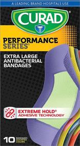 img 3 attached to Curad Performance Series Extreme Hold Antibacterial Fabric Bandages , 10 X-Large Assorted Count