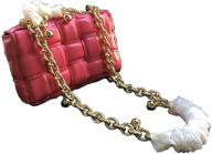 evalulu ladies' genuine leather medium handbags, wallets, and shoulder bags logo