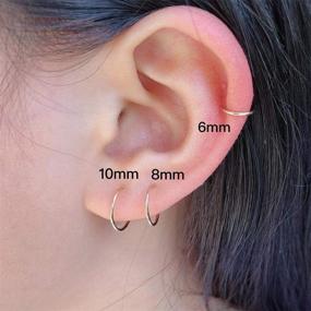 img 3 attached to 👂 Huggie Hoop Earrings for Women Men - Hypoallergenic Stainless Steel, 6mm 8mm 10mm Sizes, Available in Cartilage Gold Black, Perfect Second Hole Sleeper Earrings, 20G 18G Thickness