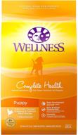🐶 wellness complete health dry puppy food - natural, made in the usa, no meat by-products, fillers, artificial flavors, or preservatives, enriched with added vitamins, minerals, and taurine логотип