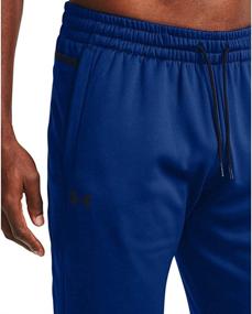 img 2 attached to Stay Cozy and Stylish 🔥 with Under Armour Men's Armour Fleece Pants