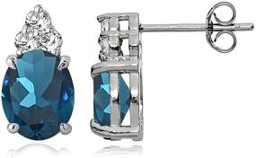 img 1 attached to Elegant Sterling Silver London Blue and White Topaz Oval Crown Stud Earrings - Add Royalty to Your Style