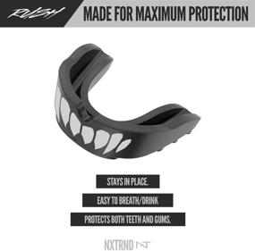 img 2 attached to 2-Pack Nxtrnd Rush Sports Mouth Guard - Professional Mouthguards for Boxing, Jiu Jitsu, MMA, Wrestling, Football, Lacrosse, and All Sports - Ideal for Adults, Youth, and Kids 11+ (B&W Fang)