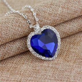 img 2 attached to HMOOY Titanic Heart of The Ocean Necklace: Stunning Silver Plated Blue Crystal Created Sapphire Pendant Jewelry for Mother's Day Gift