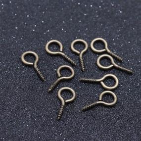 img 2 attached to Linsoir Beads: 200pcs Sturdy Metal Tiny Screw Eyes Pin Bail Peg in Antique Bronze Tone - 7X14mm