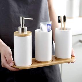 img 3 attached to JIWEIMO 4 Piece Ceramic Bathroom Accessories Set: Soap Dispenser, Toothbrush Holder, Tumbler & Wooden Tray - Version 2.0