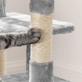 img 1 attached to 🐱 FEANDREA Cat Tree: Interactive Cat Tower with Cat Cave, 3 Pompoms & Activity Center