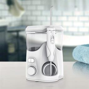 img 1 attached to Waterpik WF-06: Whitening Water Flosser - Gentle Teeth Whitening with Electric Oral Irrigation