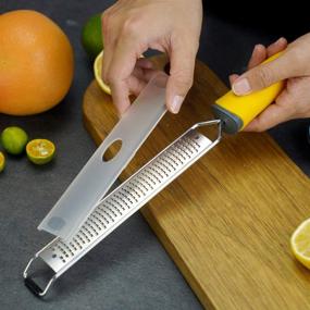 img 3 attached to 🍋 Stainless Steel Zester Grater with Handle - Lemon and Cheese Grater Slicer for Citrus, Garlic, and Chocolate. Includes Protective Cover and Brush