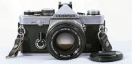 📷 enhanced olympus om-2 35mm film camera logo