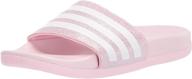 👣 adidas girls' adilette comfort sandals for toddlers, little kids, and big kids logo