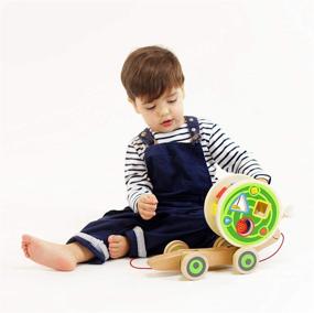 img 3 attached to 🐌Узнайте о награжденной премией игрушке Hape Walk-A-Long Snail: любимая деревянная тяговая игрушка для малышей!