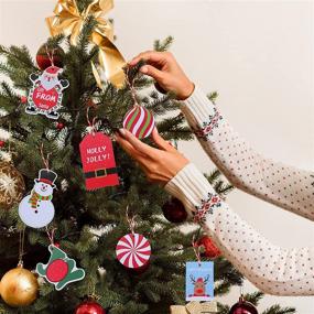 img 1 attached to 🎁 120 Рождественских ярлыков для подарков с этикетками на дереве - этикетки с именами для упаковки и нанесения меток на подарки: пишите "От кого" и "Кому" с помощью хлопковой веревки, 15 различных стилей