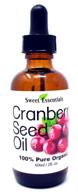 🍒 100% pure organic virgin cranberry seed oil from canada – cold-pressed, unrefined, natural moisturizer for skin, hair & face in various sizes – sweet essentials (2 fl oz glass bottle) logo