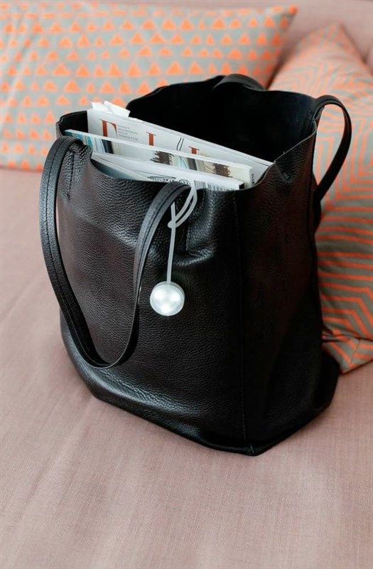 kikkerland fl38 silicone purse light 로고