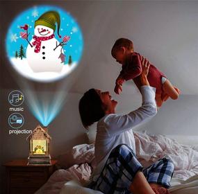 img 2 attached to LSXD Christmas Snow Globe Lantern: Projector, Timer, Music, USB/Battery Operated - Perfect Decoration & Gift for Christmas!