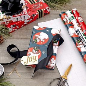 img 3 attached to 🎁 Hallmark Vintage Christmas Wrapping Paper: Cut Lines on Reverse with Funny Candy Cane Santas, Classic Snowman, and Festive Greetings (3 Rolls: 120 sq. ft. ttl, Red, White, Navy Blue)