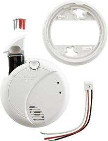 img 1 attached to White Hardwired Smoke Detector BRK 7010B with Photoelectric Sensor and Battery Backup by First Alert