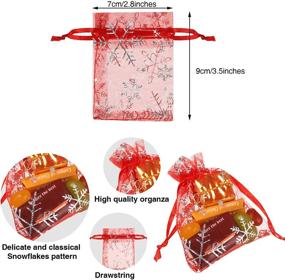 img 3 attached to Набор из 100 органзовых пакетов на Рождество с дизайном снежинок - идеально подходит для зимней свадьбы, рождественской вечеринки, ювелирных изделий и конфет - красные мешочки с закрытием на завязке.