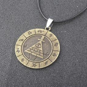 img 2 attached to Metallic Gold Bill Cipher Gravity Falls Wheel Pendant Necklace by OfficialOtaku - 0.7g Weight