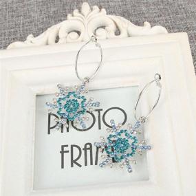 img 1 attached to 🎁 Merry Christmas Gift: Stunning Crystal Winter Snowflake Hoop Dangle Earrings by EVER FAITH