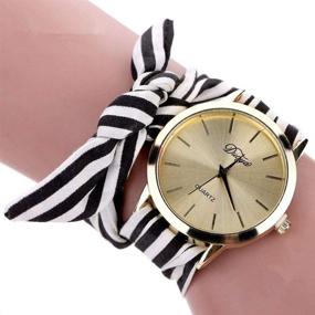 img 1 attached to 🎀 YAMULA Women's Bow Bracelet Wristwatch: Chic Black & White Fabric Stripe Design