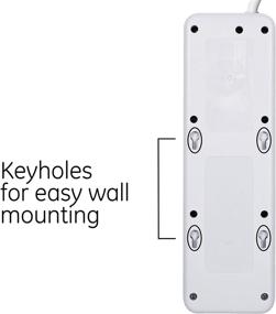 img 2 attached to 🔌 GE UltraPro защита от перенапряжения с 7 розетками, 2 портами USB, удлинительным шнуром длиной 15 футов, 1080 джоулей, 2,4 Ампера/12 Ватт, 3 розетками с разъемами, плоским штепселем, креплением на стену, гарантией, соответствует требованиям UL, белая, модель 36362