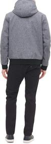 img 3 attached to DKNY Softshell Men's Hooded Bomber Jacket