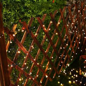 img 1 attached to 🎄 Warm White Outdoor Solar Christmas String Lights - 100 ft 300 LED Indoor/Outdoor String Lights, Auto ON/Off Waterproof Solar Christmas Decorations Lights for Patio Fence, Balcony, Party, Xmas Decor